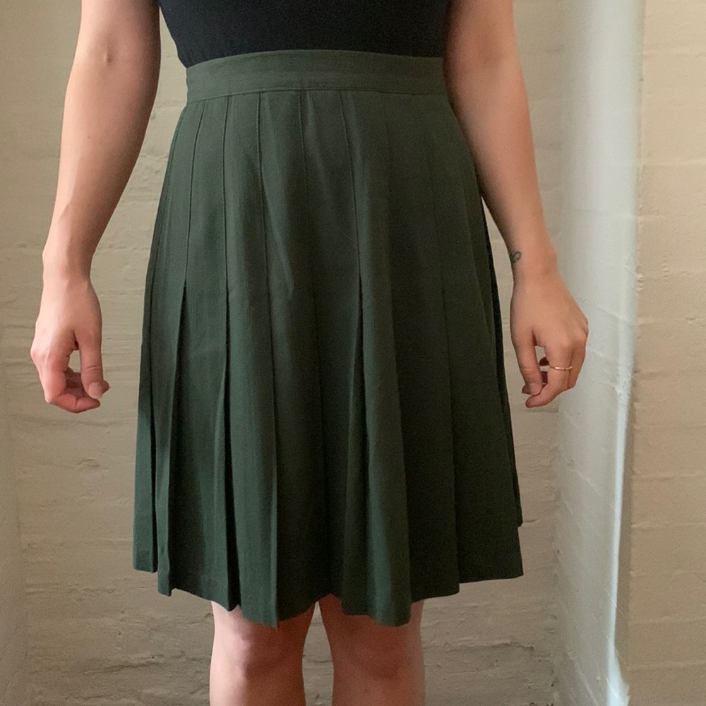Green knee length pleated skirt
